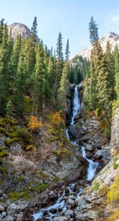 Barskon or Barskoon waterfall, mountain landscape with waterfall in a mountain valley, Jeti-Ögüz,