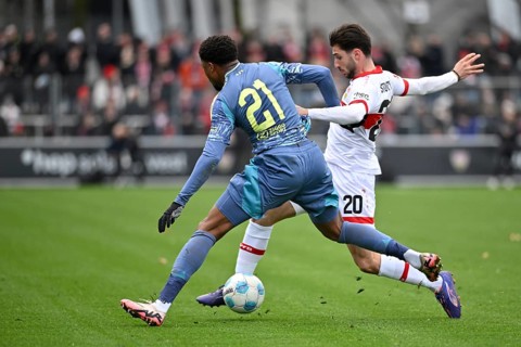 Duel, action Loenidas Stergiou VfB Stuttgart (20) against Chuba Akpom Ajax Amsterdam (21)