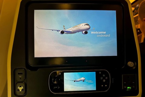 Aircraft of the airline Etihad, interior with monitor for the passenger with the text welcome