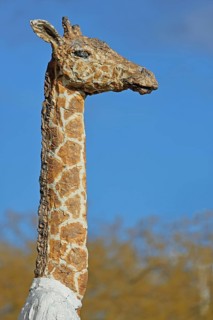 Sculpture giraffe man by Stephan Balkenhol, modern art, giraffe figure, giraffe man, animal figure,