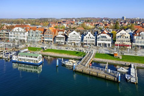 View over shops and restaurants along picturesque Vorderreihe at seaside resort Travemünde,