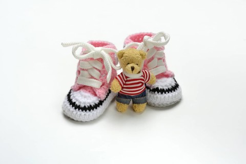 Pink baby shoes with teddy bear