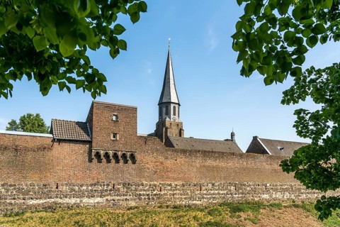 Town wall and parish church of St Martinus in the town of Zons, Dormagen, Lower Rhine, North