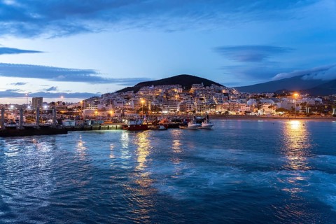 City view of Los Cristianos and the harbour at dusk, Tenerife, Canary Islands, Spain, Europe