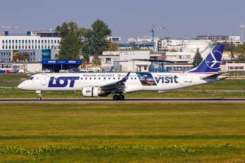 An Embraer 195 aircraft of LOT Polish Airlines with the registration SP-LNI and the Visit North