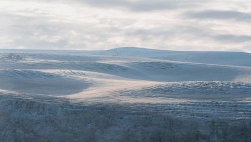 Snow and glacier ice of the Myrdalsjökull glacier in the evening light, Pakgil, Iceland, Europe