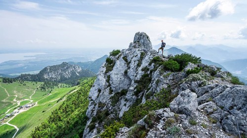 Climber on a climbing tour, climber on a mountain ridge, alpine climbing, crossing the Kampenwand,