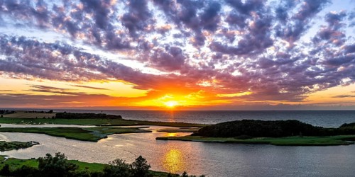 Sunset by the sea on the Baltic Sea Panorama in Heiligenhafen, Germany, Europe