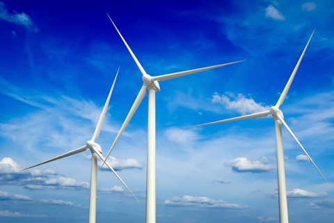 Green renewable energy concept, wind generator turbines in sky
