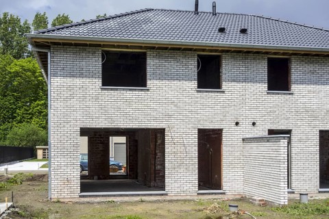 Construction phase of newly built house, new development semi-detached house