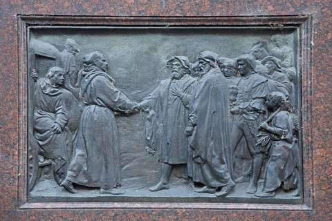 Relief with life story of Martin Luther, reception at the university in 1522, greeting, figures,