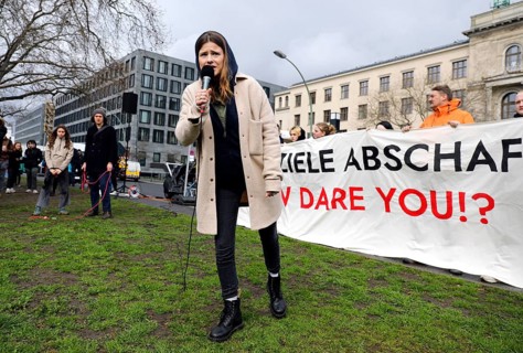 Luisa Neubauer speaks during a demonstration by Fridays for Future for compliance with climate