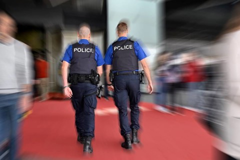 Wipe-clean image of policemen on patrol