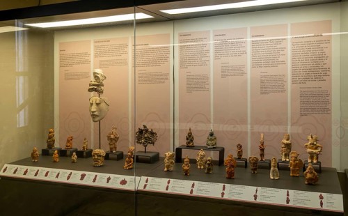 Display case of figurines and decorateive objects, Period, Mayan archaeological museum, Fort San