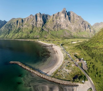 Aerial view of campsite at beach Ersfjordstranden, fjord Ersfjord, golden restroom, Senja island,