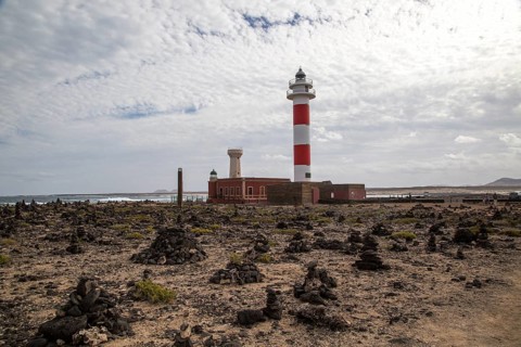 Red and white striped lighthouse, Faro de Toston, El Cotillo, Fuerteventura, Canary Islands, Spain,