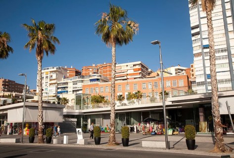 People walking in the newly redeveloped port area of shops and bars Malaga, Spain, Muelle dos,