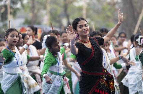 An instructor dance Bihu, as she teach participants during a Bihu dance workshop, ahead of Rongali