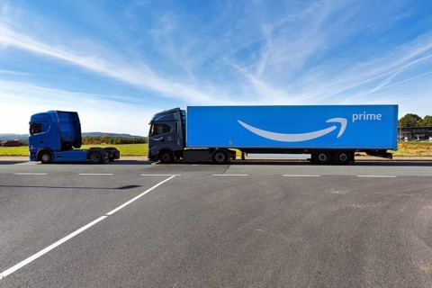 Blue truck with Amazon Prime logo parked on the roadside, PAD2 logistics centre, Amazon.com, online