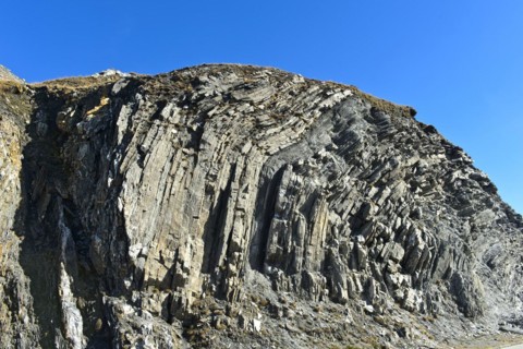 Folded rock layer, geological outcrop on the Furka Pass, Obergoms, Valais, Switzerland, Europe