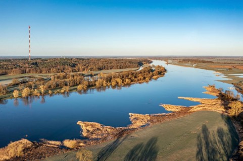 Aerial view of river Elbe near Lenzen, view to Höhbeck radio mast, early spring, Germany, Europe