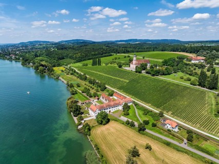 Aerial view of Maurach Castle on Lake Constance, below the Birnau pilgrimage church on a vineyard,