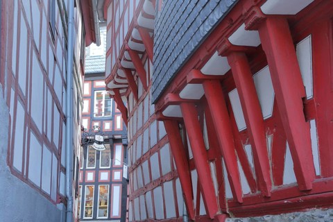 Half-timbered houses in narrow alley, idyll, red wooden beams, narrow, old town, Limburg, Hesse,
