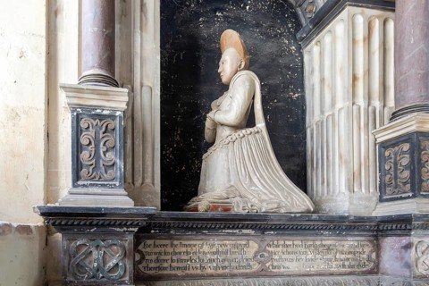 Woman kneeling family memorial monument, Kedington church, Suffolk, England, UK, Grissell
