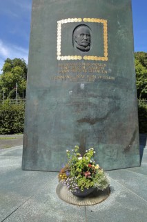 Ferdinand Graf von Zeppelin monument with head relief and quote, You only have to want and believe