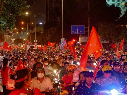Football fans celebrate in the streets, victory in Asean championship against Thailand, many