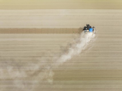 Tractor at field work. Aerial view. Drone shot. Cádiz province, Andalusia, Spain, Europe