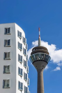 Gehry buildings and Rhine Tower, Media Harbour, Neuer Zollhof, Düsseldorf, North Rhine-Westphalia,