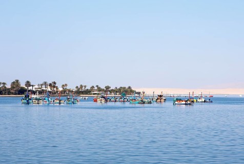 Colourful fishing boats in the bay of Paracas, Reserva Nacional de Paracas, Ica region, Pisco