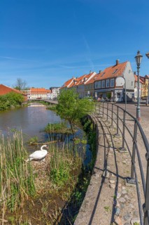 Old town of Nyborg, moat around the medieval town, restored, historic houses, bright colours, reed