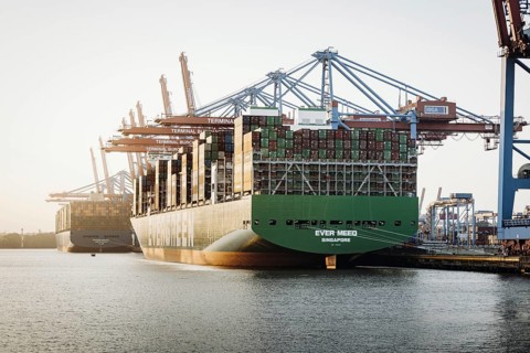 Shot of the Burchardkai container terminal with container ships from Evergreen, CMA, and HMM in the