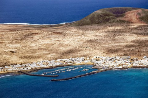 View from the Mirador del Río viewpoint, designed by artist César Manrique, of the harbour on the