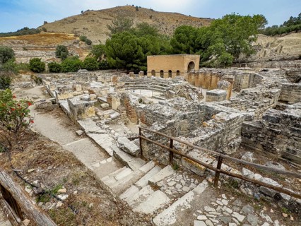 Overview of ruins of historic Roman amphitheatre from antiquity in excavation site remains of