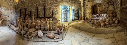 Panoramic photo of view of ancient amphorae from wreck recovered in Mediterranean Sea sunken sea