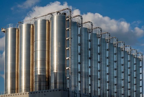 Stainless steel tanks of a large silo facility in Duisburg inland harbour, Duisburg-Neuenkamp, for