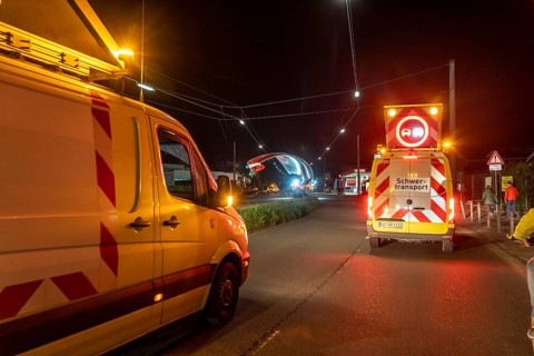 Transport of a 68 metre long, 22 tonne blade of a wind turbine, here in Schwelm, with a