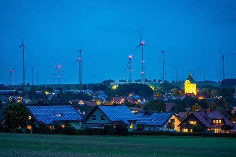 Wind farm above the village of Lichtenau, self-proclaimed energy town, houses with photovoltaic
