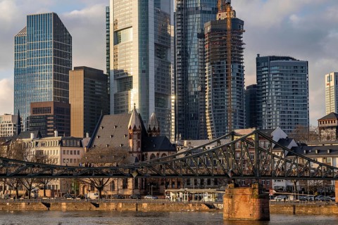 Skyline of the city centre of Frankfurt am Main, river Main, Eiserner Steg bridge, dusk, Hesse,