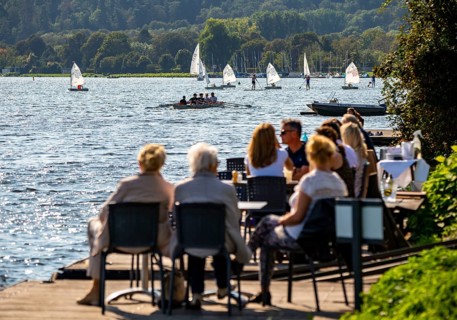 Lake Baldeney in Essen, Ruhr reservoir, sailing boats, café terrace on the shore, Essen, North