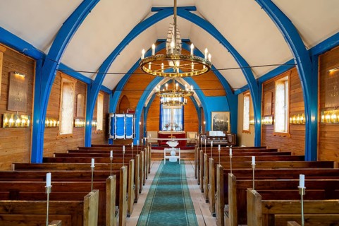 Church interior with wooden benches, church, Inuit settlement Ittoqqortoormiit, Scoresbysund or
