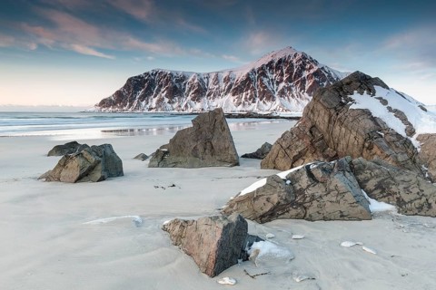 Winter evening mood at Skagsanden, stones on the beach near Flakstad, Flakstadøy, Lofoten,