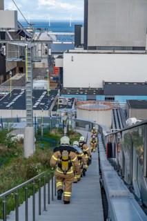 CopenHill, waste incineration plant and artificial ski slope, firefighters under respiratory