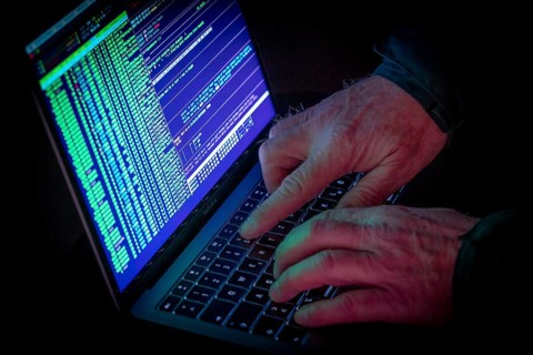 Symbolic image cyber attack, computer crime, cybercrime, computer hackers attack a network,