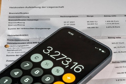 Symbolic image of service charge statement, heating cost statement, rental costs, list of