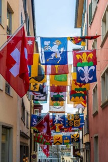 Augustinergasse with Swiss flags, Old Town, Zurich, Switzerland, Europe