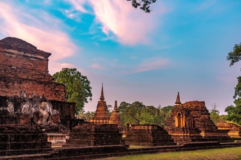 The central Buddhist temple Wat Mahathat at sunset, UNESCO World Heritage Sukhothai Historical